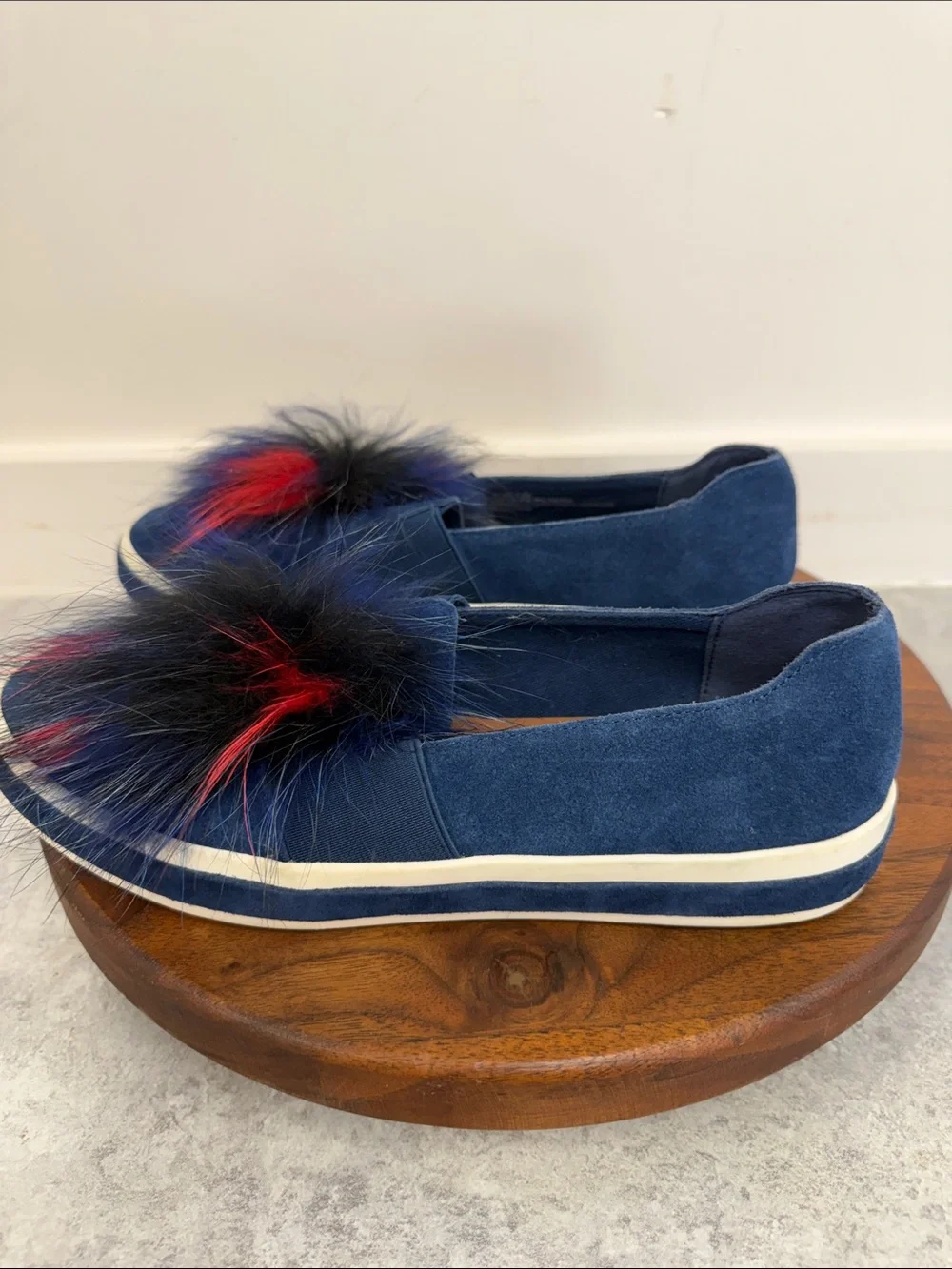 Sondra Roberts Navy Slip-On Sneakers with Red and Black Faux-Fur Poms‎